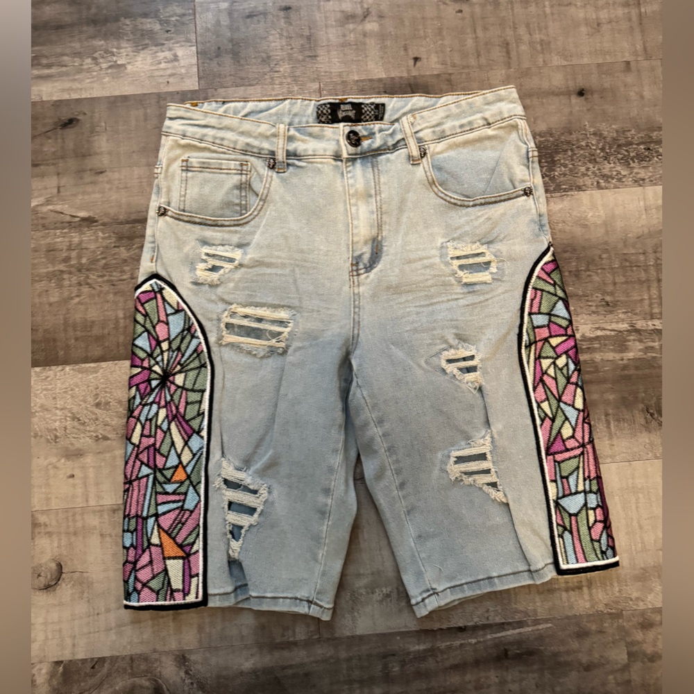 STAINED GLASS PATCHWORK JORTS (SKULL HARDWARE)